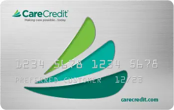 CareCredit card with silver background, green and teal logo, embossed card number
